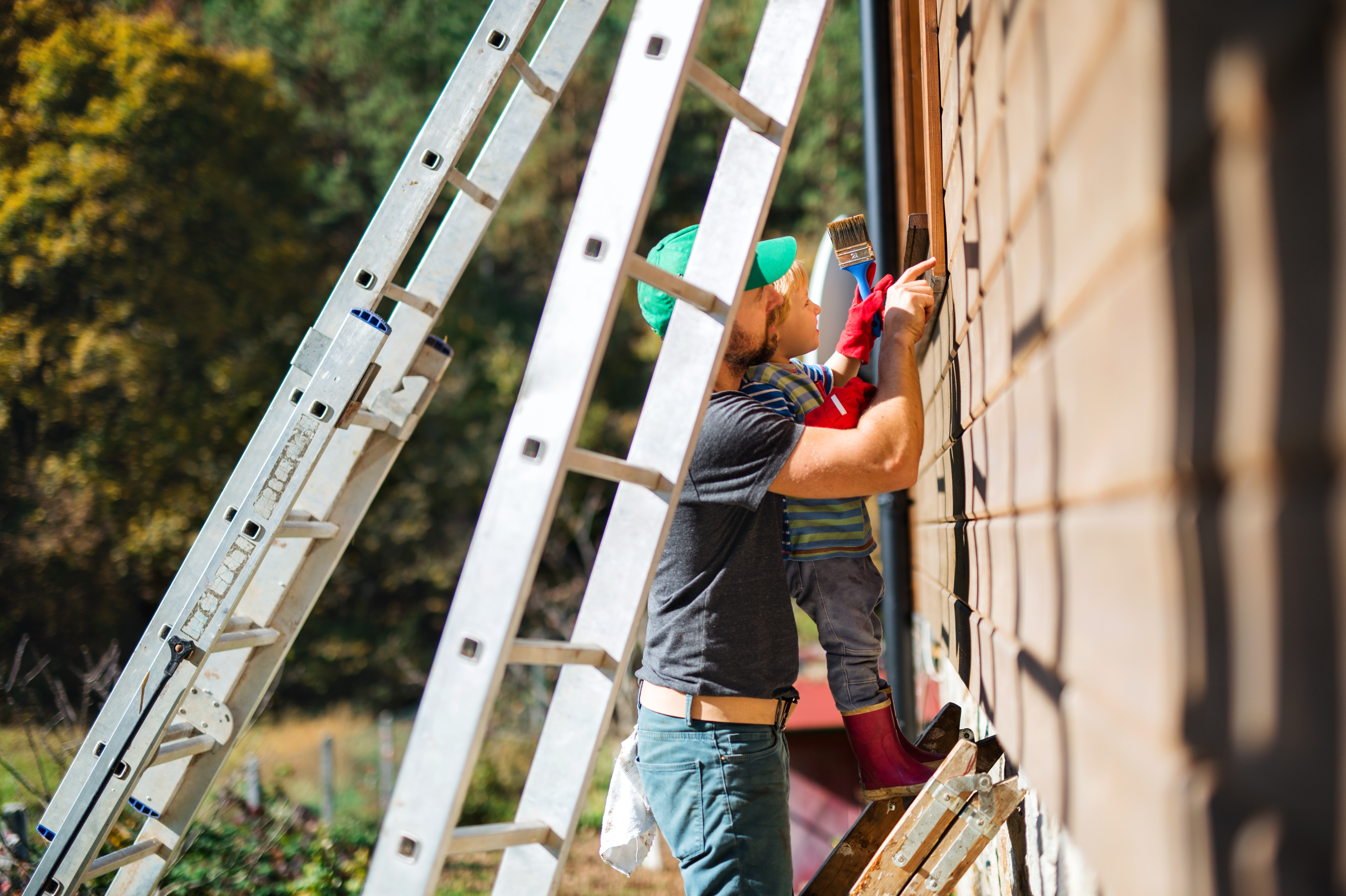 a-father-and-toddler-boy-outdoors-in-summer-paint-2023-11-27-05-12-36-utc